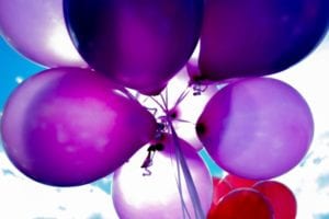 Purple, blue, and red balloons