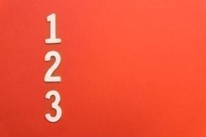 numbers one, two, and three in white, on a red background