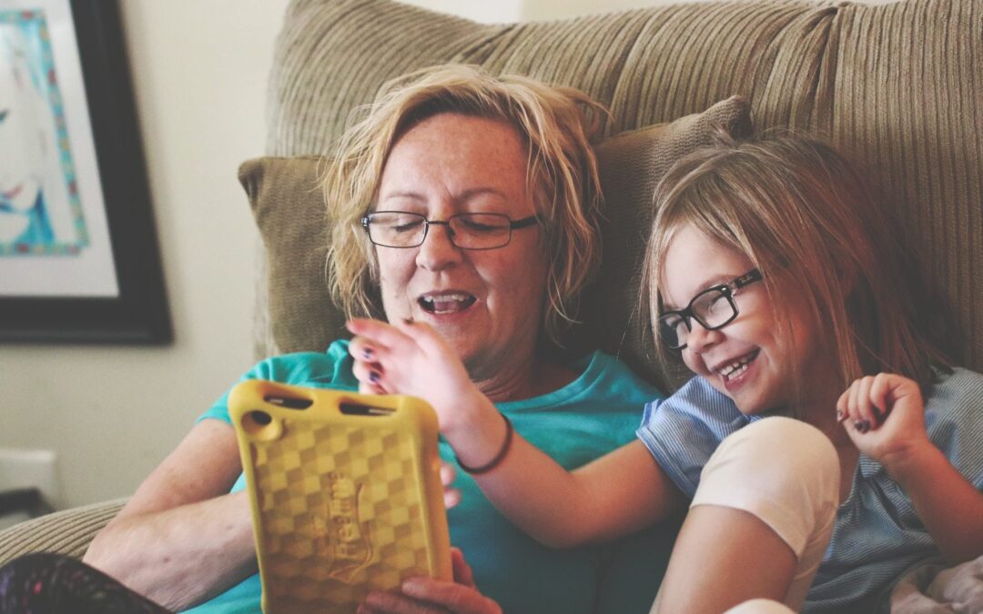 woman-and-girl-using-tablet-computer-1312023