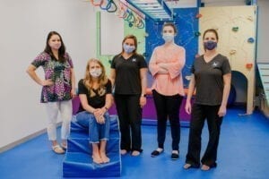 Staff of Emerge Pediatric Therapy inside the Cary Sensory Gym