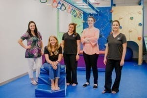 Staff of Emerge Pediatric Therapy inside the Cary Sensory Gym