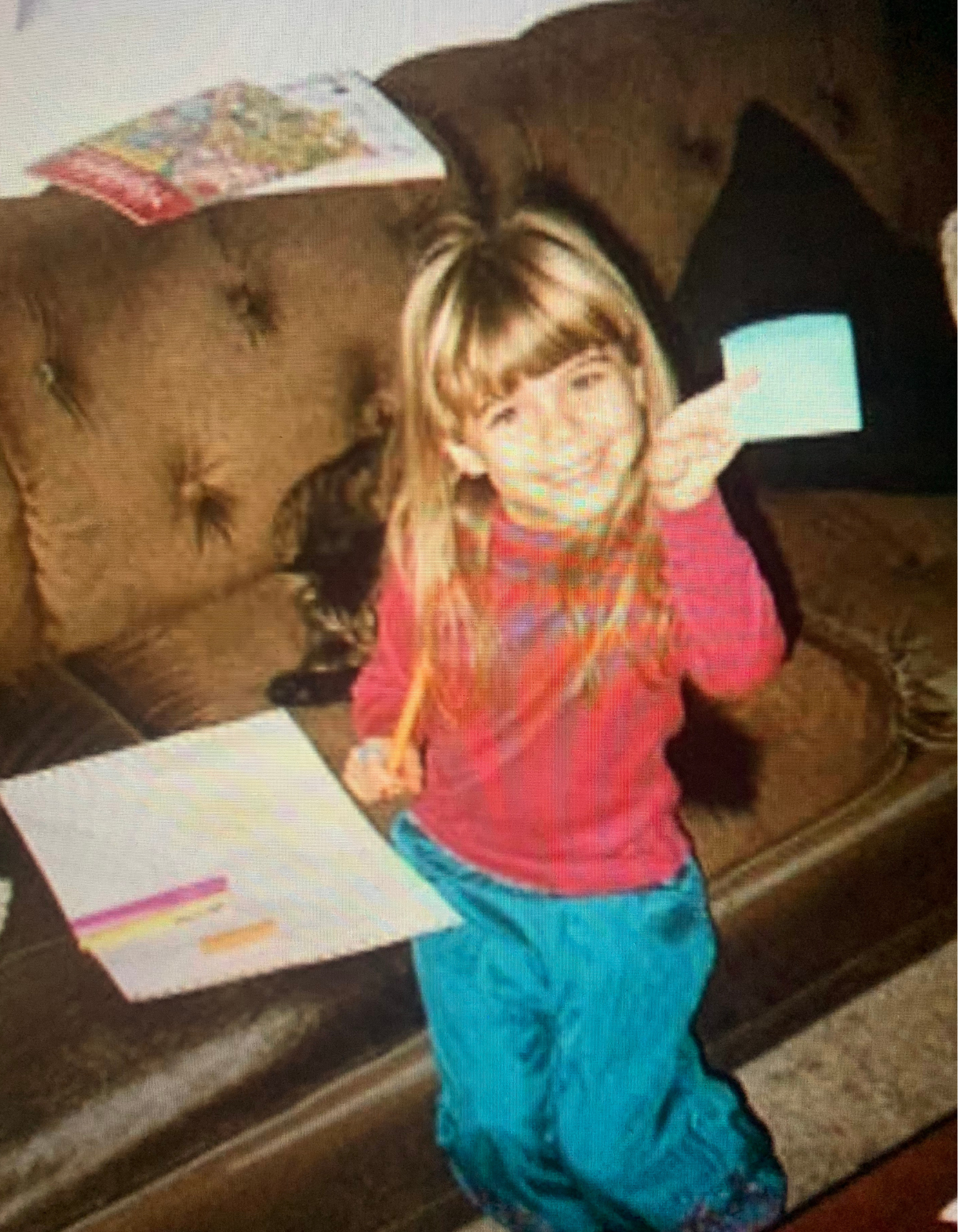 Speech Language Pathologist Anna Housman posing in a ballerina outfit with a dance baton